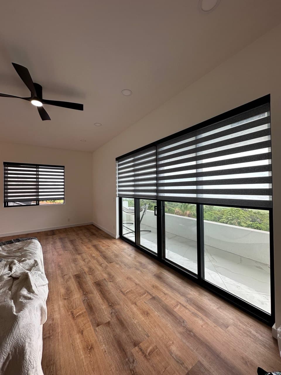 Bedroom with custom zebra blinds