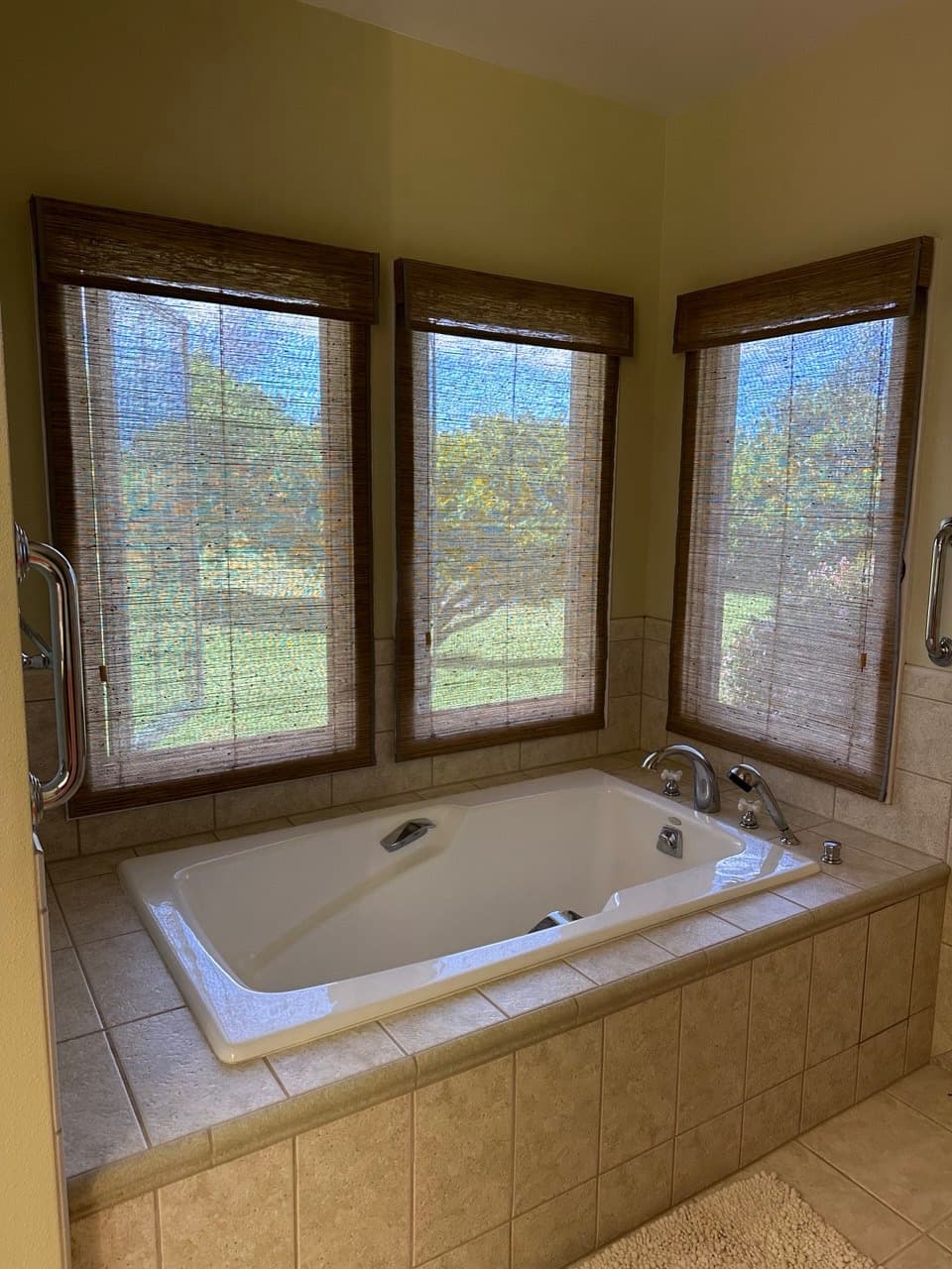 Bathroom with woven wood blinds